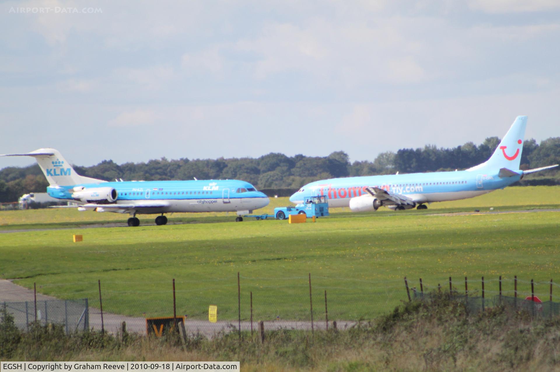 Norwich International Airport, Norwich, England United Kingdom (EGSH) - Congestion on the taxi way.