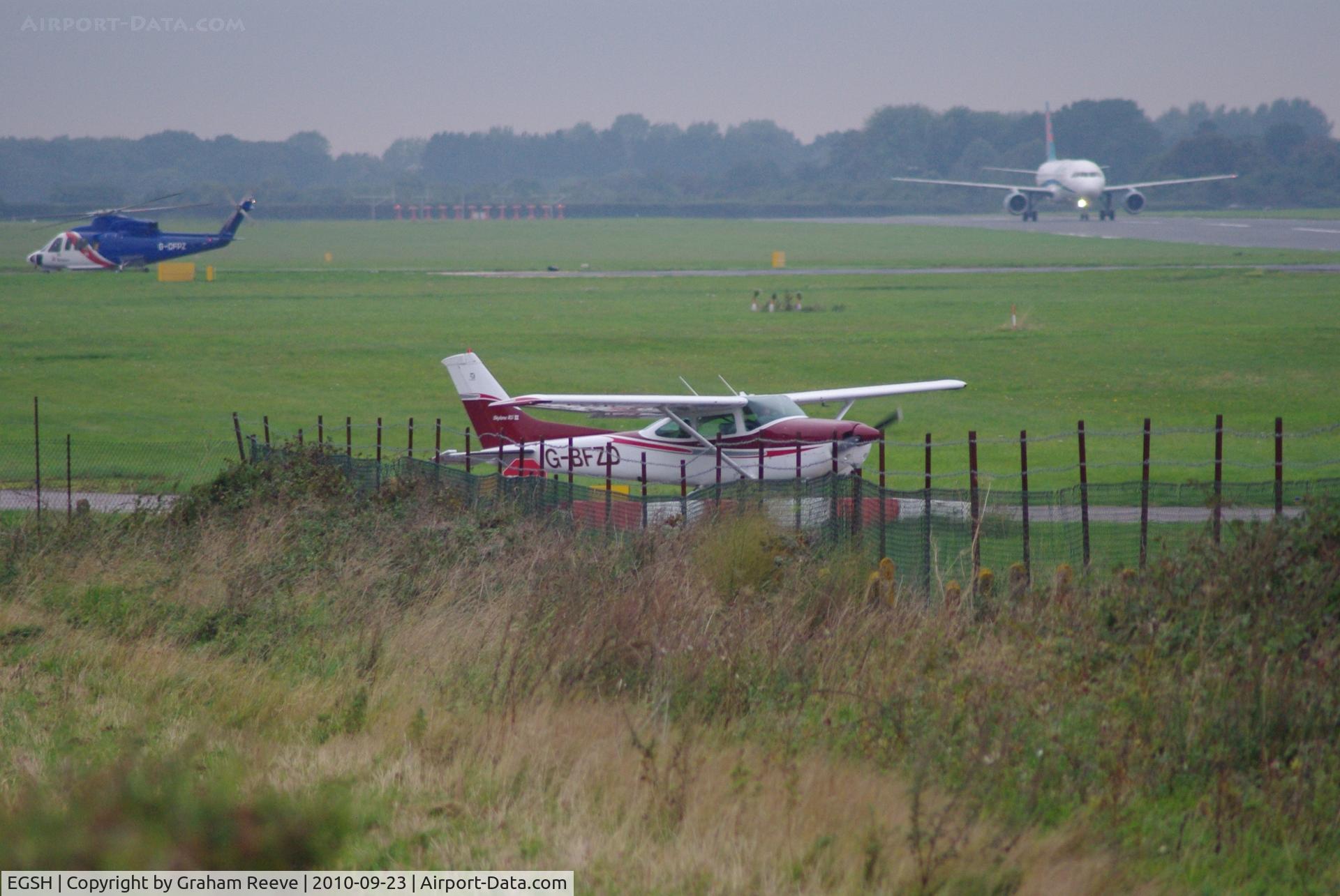 Norwich International Airport, Norwich, England United Kingdom (EGSH) - A busy wet afternoon.