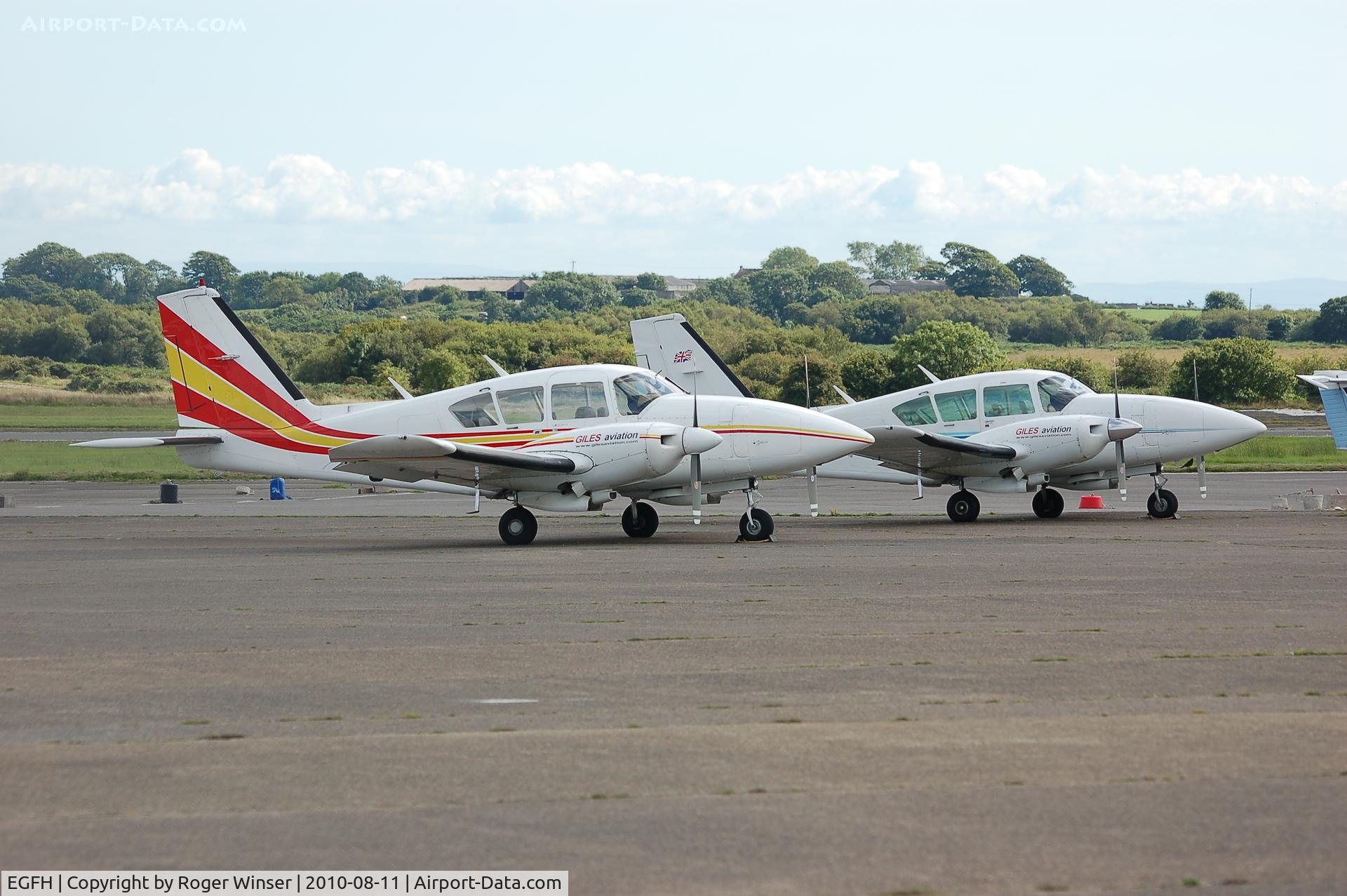 Swansea Airport, Swansea, Wales United Kingdom (EGFH) - Visiting Piper Aztecs of Giles Aviation.