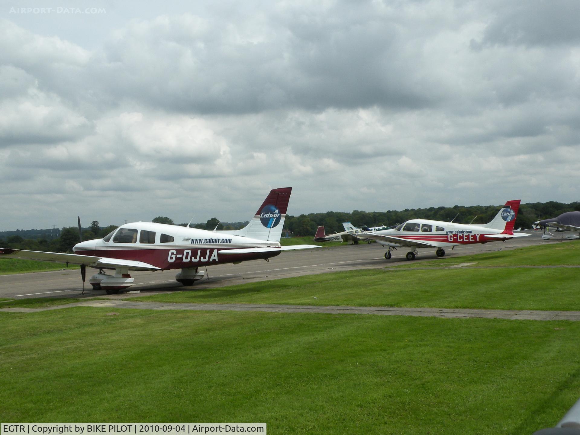 Elstree Airfield Airport, Watford, England United Kingdom (EGTR) - Parking in front of Cabair flight ops