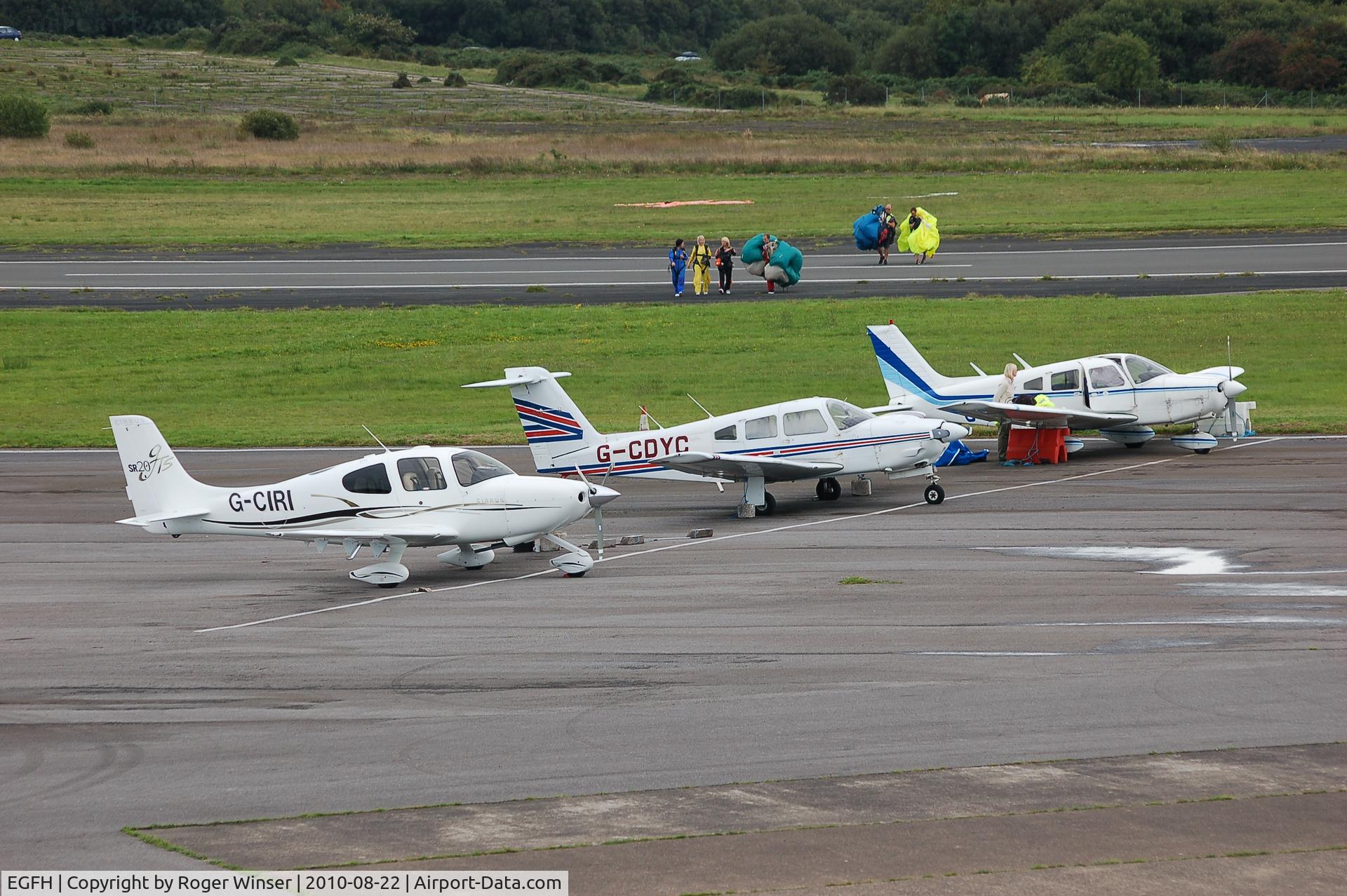 Swansea Airport, Swansea, Wales United Kingdom (EGFH) - Visiting and resident aircraft on the apron.