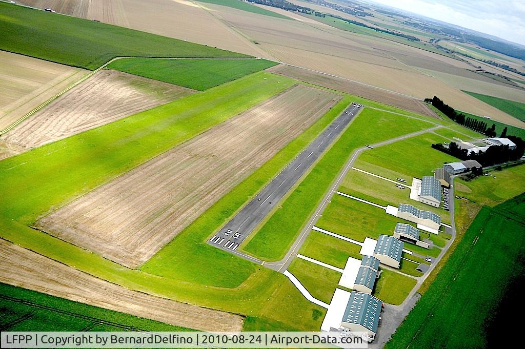 Le Plessis-Belleville Airport, Le Plessis-Belleville France (LFPP) - LFPG with work being carried out on grass runway, which explains its brownish color.