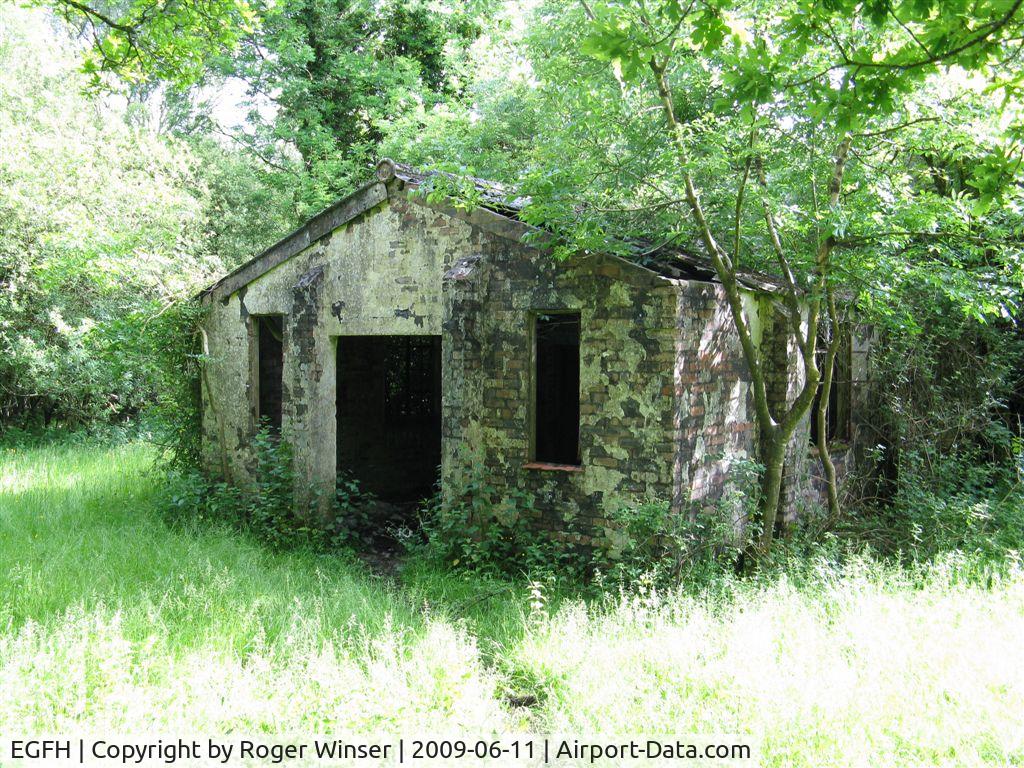 Swansea Airport, Swansea, Wales United Kingdom (EGFH) - Remains of a former RAF Fairwood Common dispersal building used by the aircrew of twin-engined aircraft in the 1940's. Located just outside the airport perimeter fence near the threshold to Runway 04.