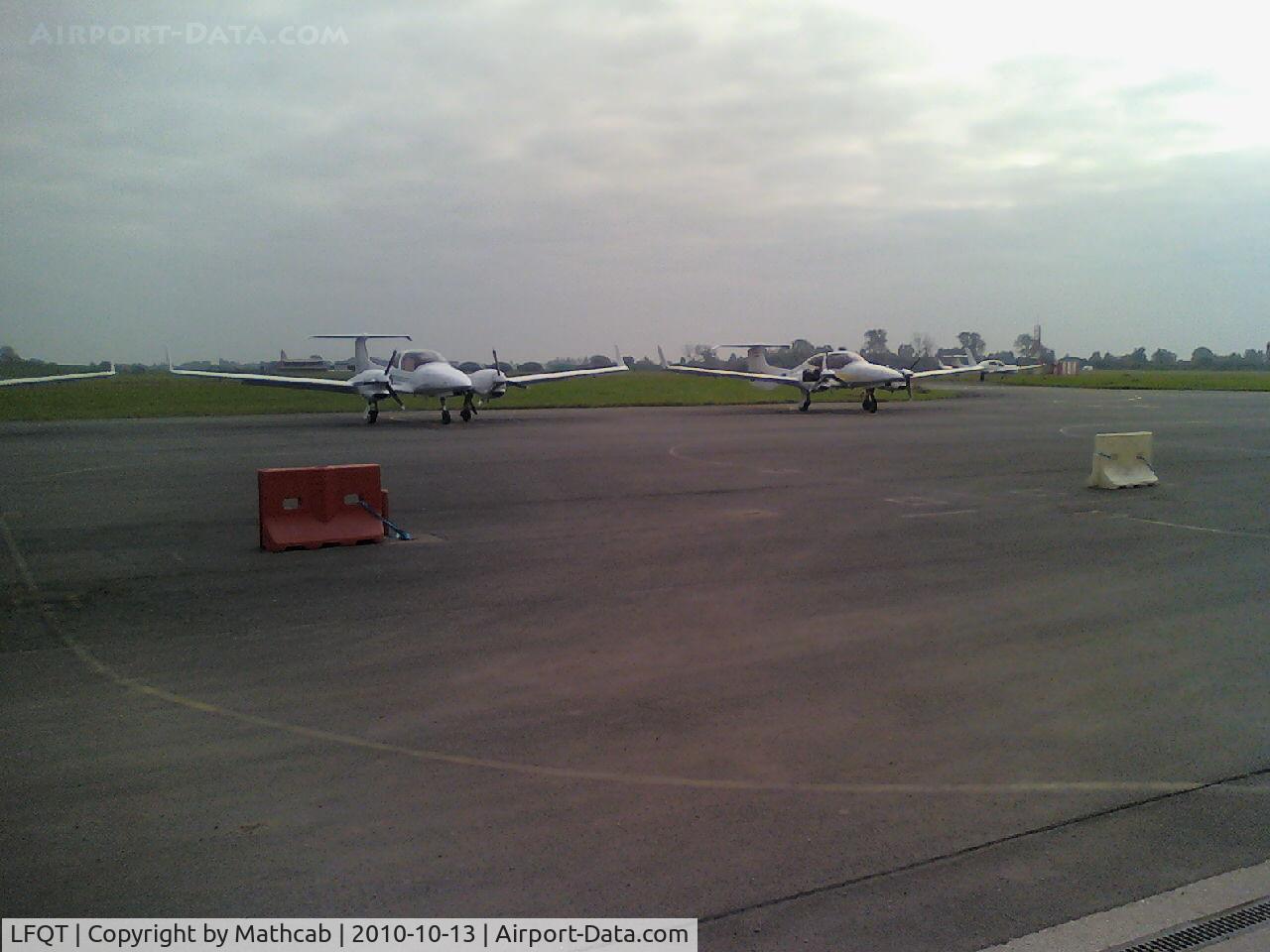 Merville Calonne Airport, Merville / Hazebrouck France (LFQT) - Merville's parking (two DA42)
