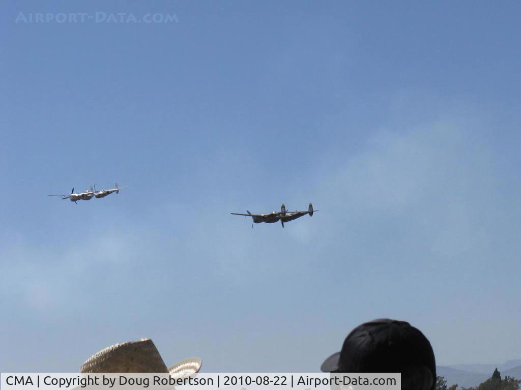 Camarillo Airport (CMA) - Formation Flight-two Lockheed P-38 LIGHTNINGS N7723C in lead & N138AM at 2010 Wings Over Camarillo 30th Annual Airshow. (You are seeing about half of the World's airworthy P-38s in one photo)