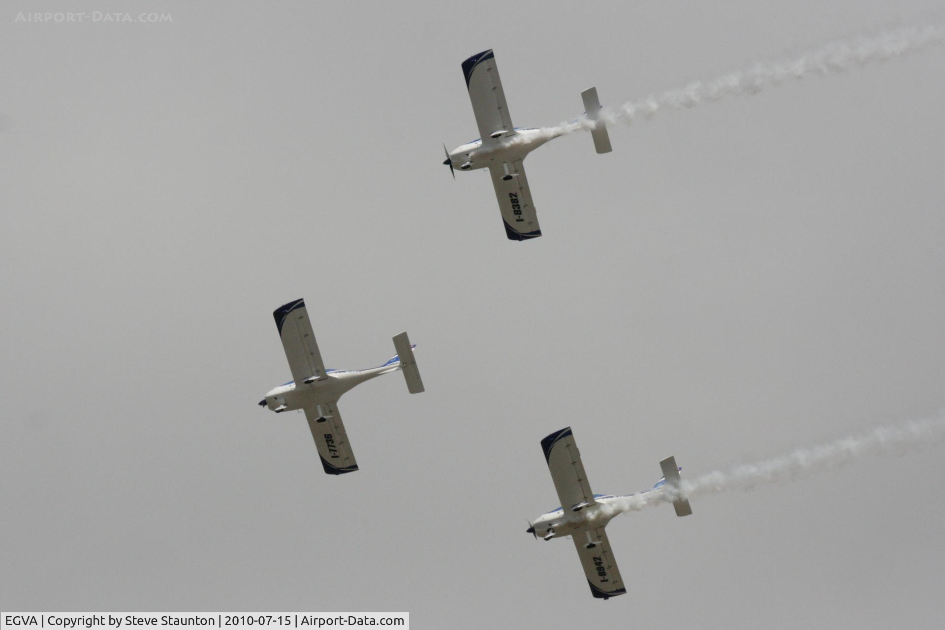 RAF Fairford Airport, Fairford, England United Kingdom (EGVA) - Texan Team, three disabed pilots flying close formation in these ultra lights - taken at the Royal International Air Tattoo 2010