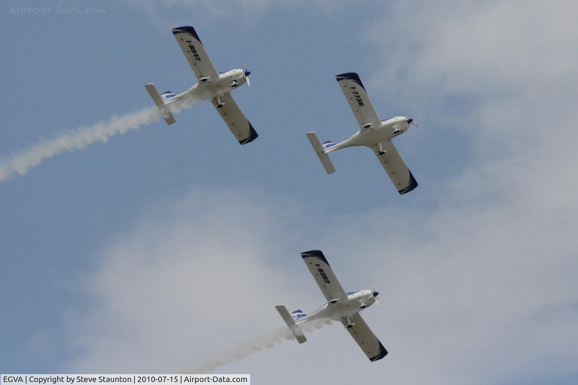 RAF Fairford Airport, Fairford, England United Kingdom (EGVA) - Texan Team, three disabed pilots flying close formation in these ultra lights - taken at the Royal International Air Tattoo 2010