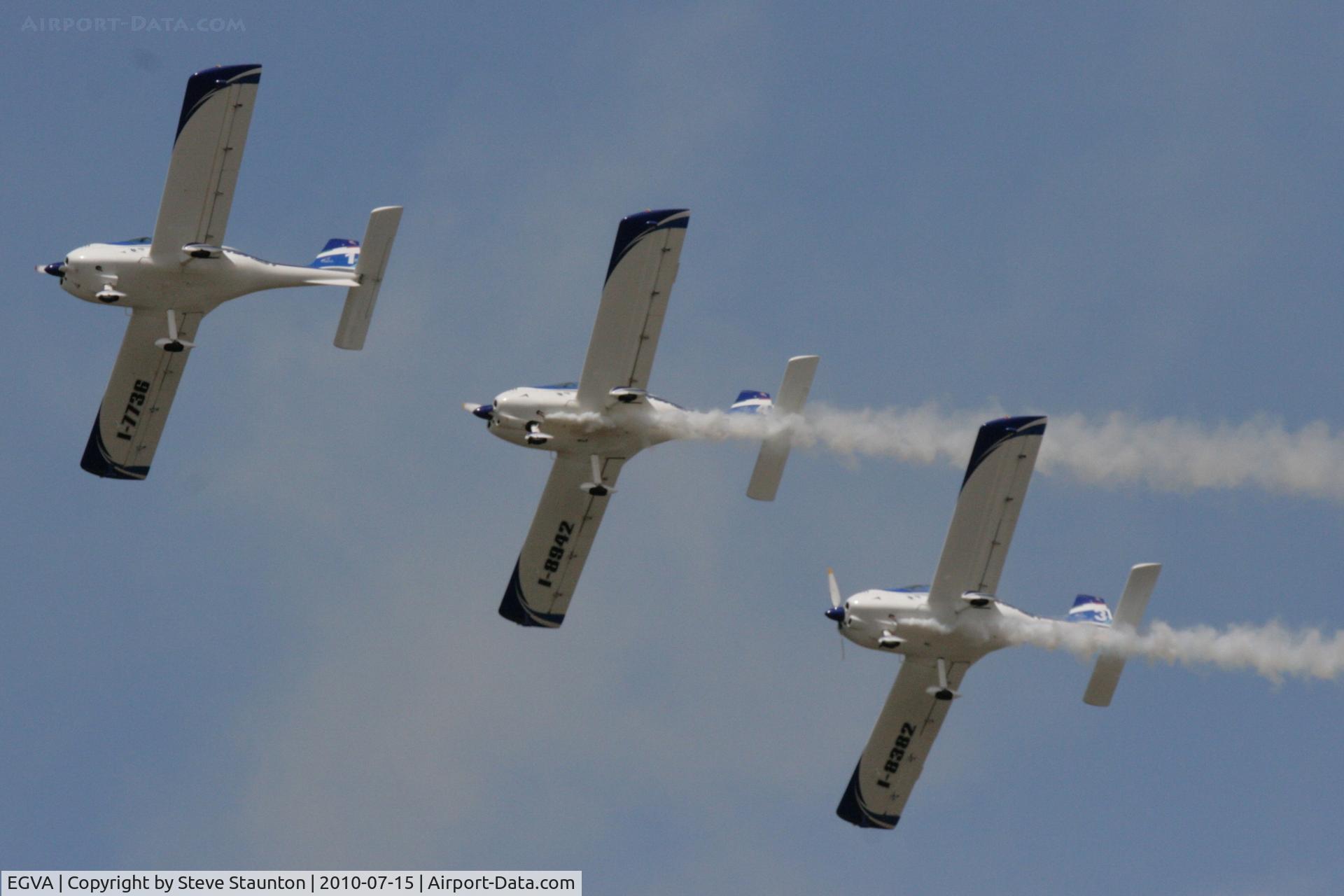 RAF Fairford Airport, Fairford, England United Kingdom (EGVA) - Texan Team, three disabed pilots flying close formation in these ultra lights - taken at the Royal International Air Tattoo 2010