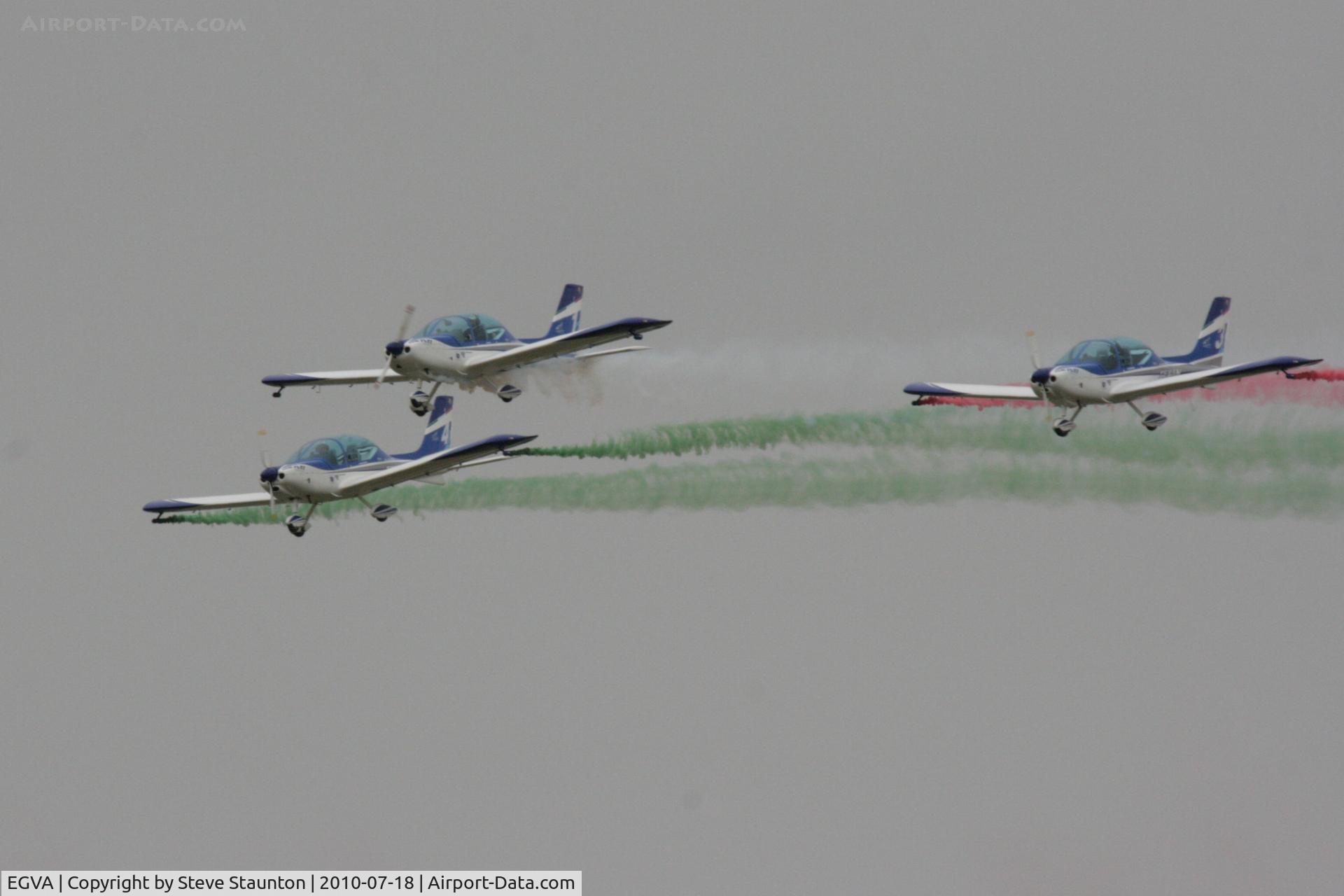 RAF Fairford Airport, Fairford, England United Kingdom (EGVA) - Texan Team, three disabed pilots flying close formation in these ultra lights - taken at the Royal International Air Tattoo 2010