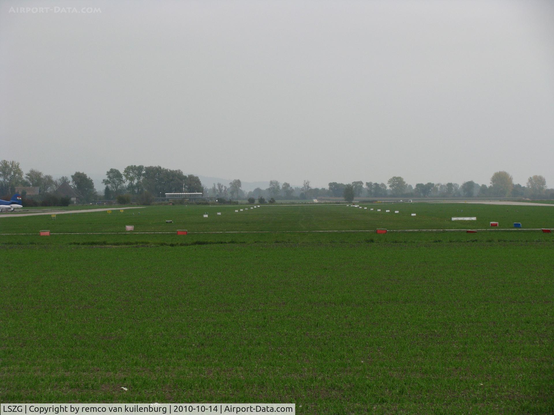 LSZG Airport - Grass Runway 07R-25L left of the hard surfaced runway