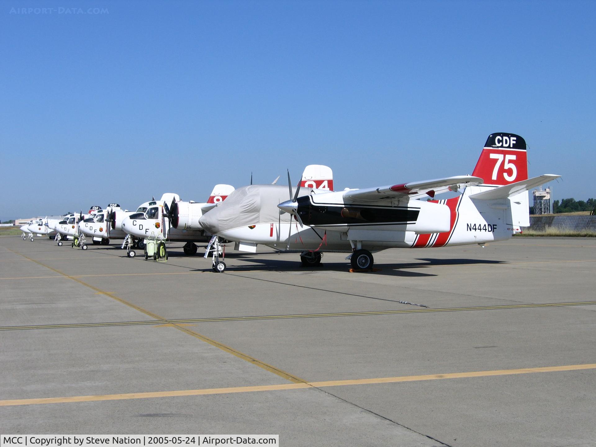 Mc Clellan Airfield Airport (MCC) - CAL FIRE/CDF S-2T and TS-2A tankers on ramp just prior to start of 2005 fire season (last year piston TS-2As in service)