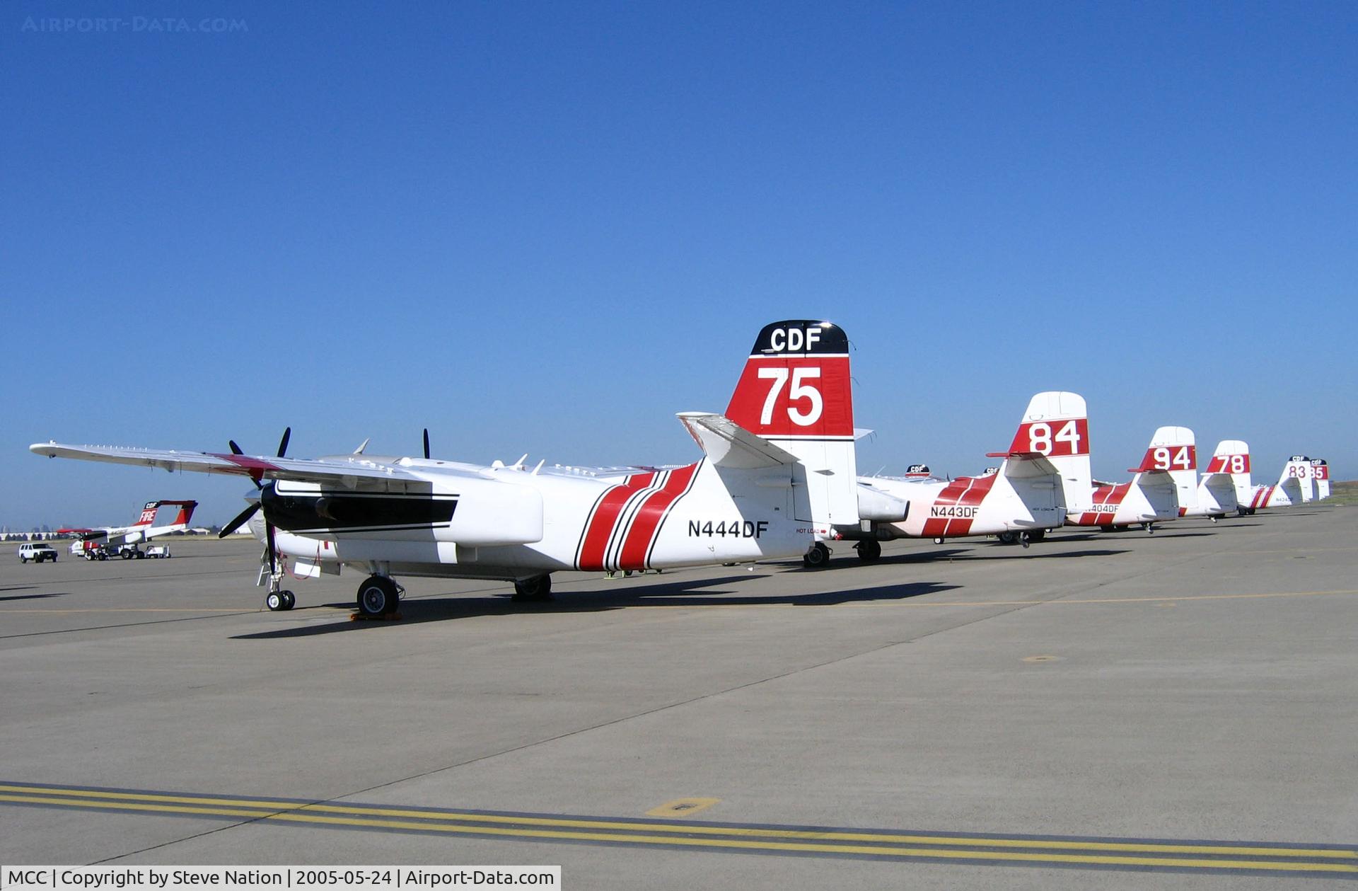 Mc Clellan Airfield Airport (MCC) - CAL FIRE/CDF S-2T and TS-2A tankers on ramp just prior to start of 2005 fire season (last year piston TS-2As in service)