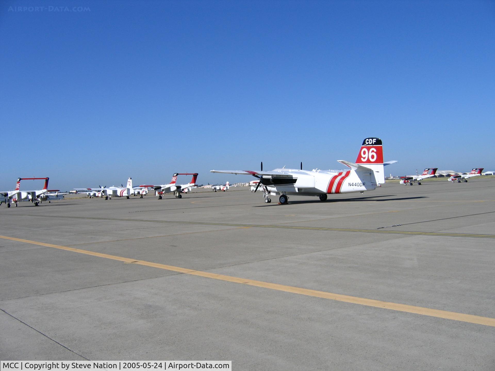 Mc Clellan Airfield Airport (MCC) - CAL FIRE/CDF S-2T and TS-2A tankers and OV-10 lead planes on ramp just prior to start of 2005 fire season (last year piston TS-2As in service)