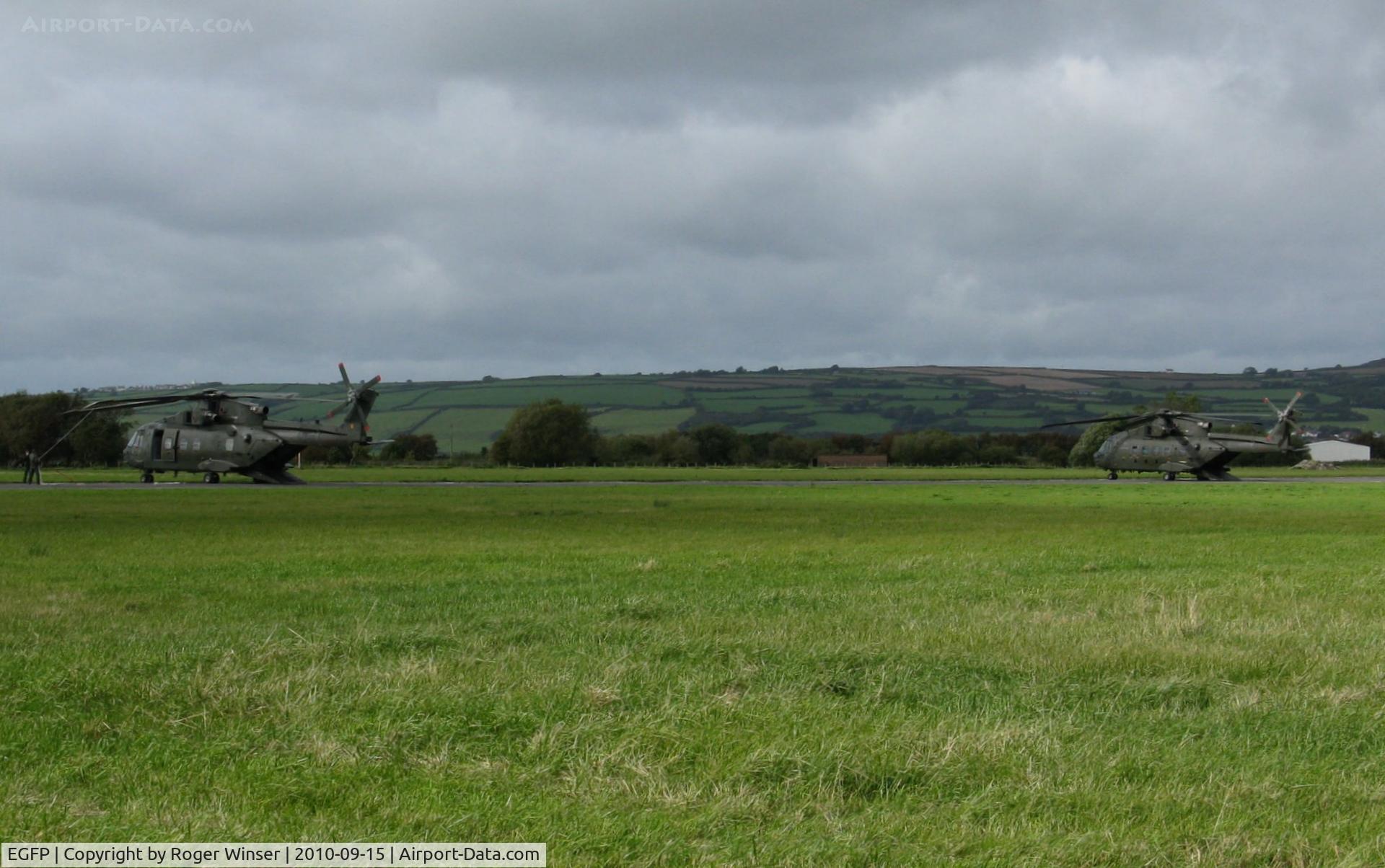 Pembrey Airport, Pembrey, Wales United Kingdom (EGFP) - Two RAF Merlin helicopters at the airport