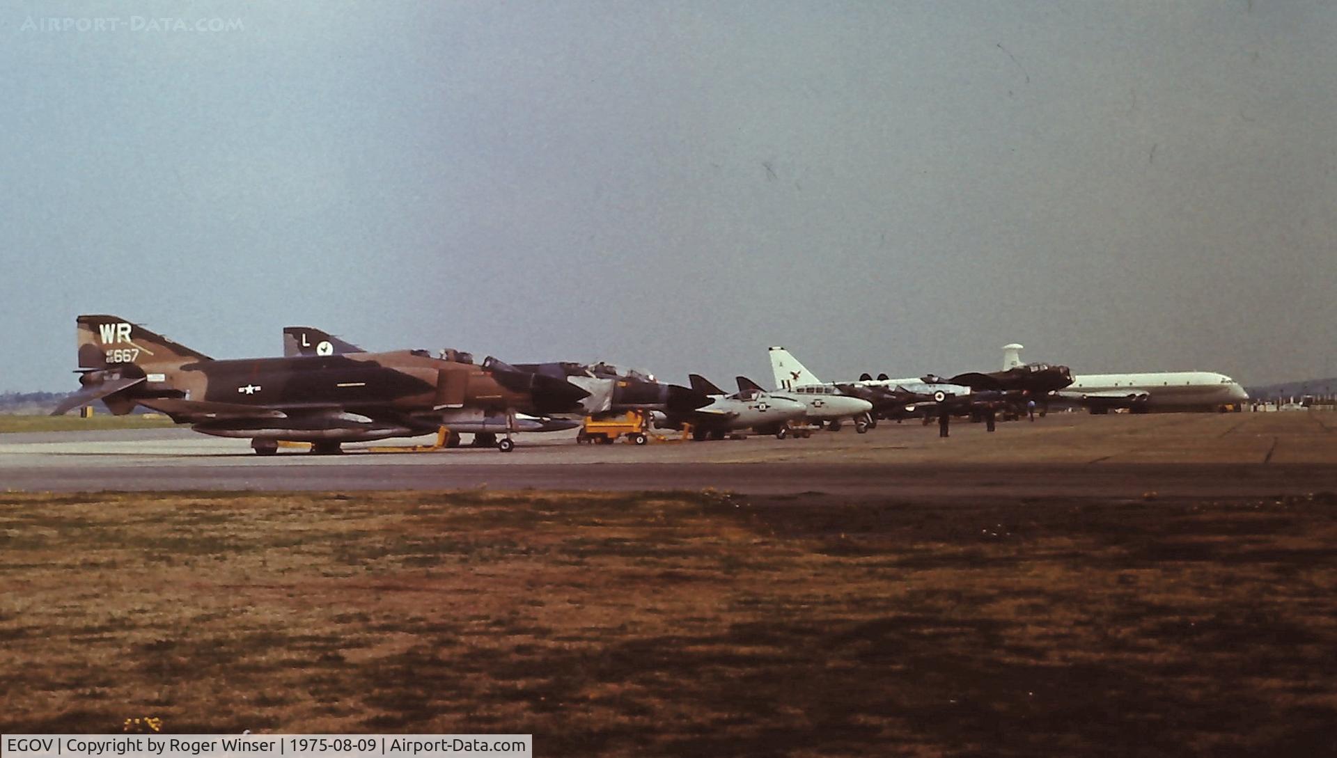 Anglesey Airport (Maes Awyr Môn) or RAF Valley, Anglesey United Kingdom (EGOV) - Line up of visiting aircraft at the RAF Valley Air Show 1975.