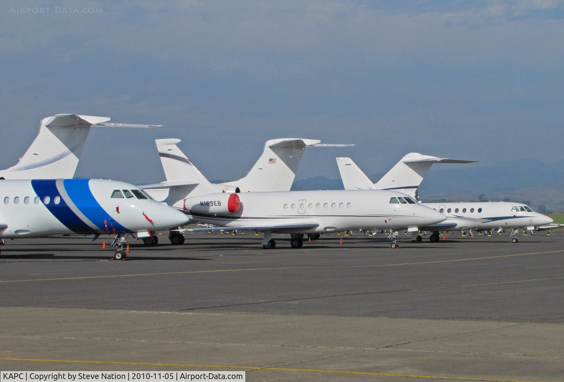 Napa County Airport (APC) - The French Connection - Corning Inc. 2009 Falcon 900EX N18CG, PCS Aviation Services 2000 Falcon 2000EX and Silver Ventures 2000 Falcon 50 - on heavy jet ramp 