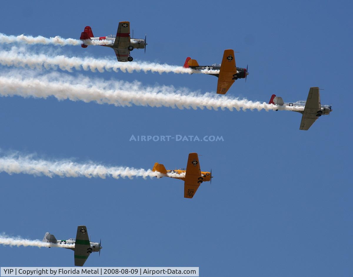 Willow Run Airport (YIP) - T-6s in formation with a single BT-13