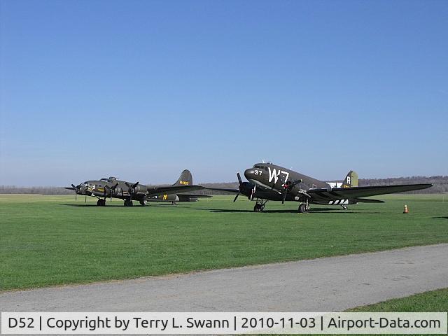 Geneseo Airport (D52) - B-17 The Movie Memphis Belle and C-47 D Day survivor sitting in the grass at Geneseo.