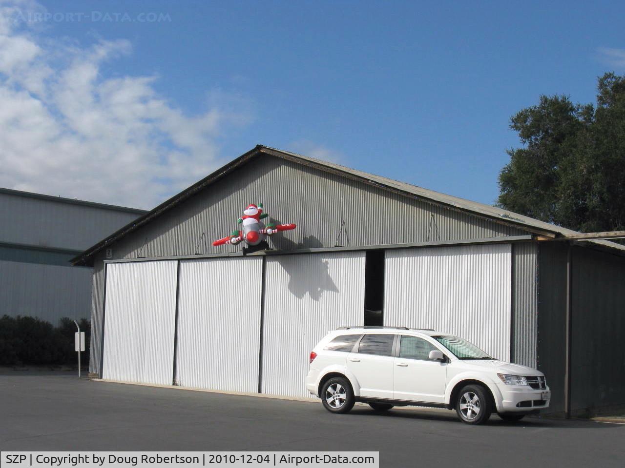Santa Paula Airport (SZP) - Santa Claus' Flight Turning & Burning at 2 TAXI, (twin engine for reliability-the props are turning in the wind)
