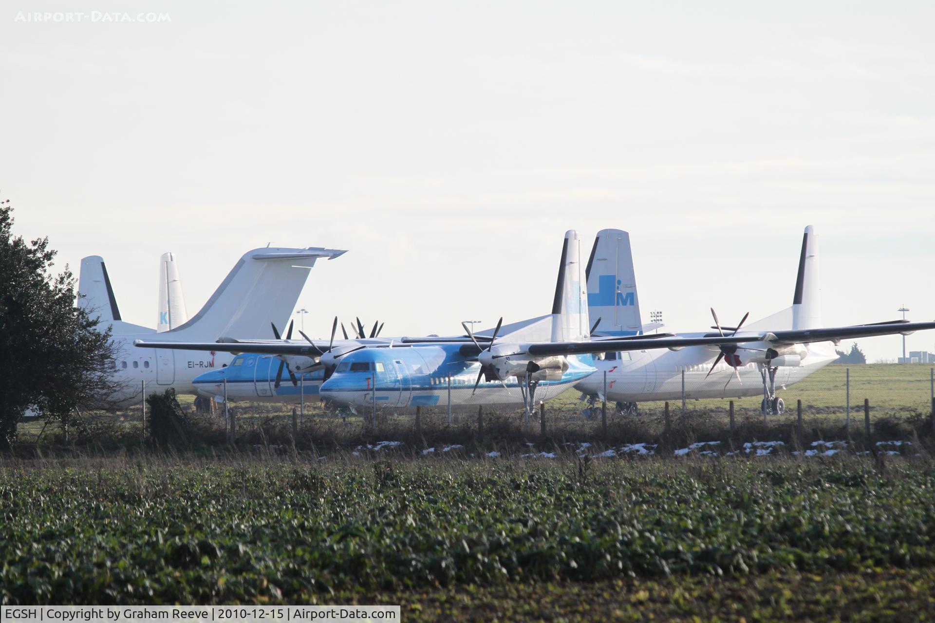 Norwich International Airport, Norwich, England United Kingdom (EGSH) - Five of the seven Fokker 50's now stored at Norwich.