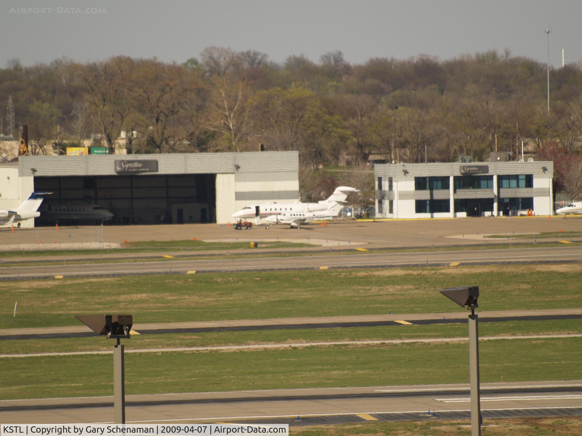 Lambert-st Louis International Airport (STL) - TWO UNKNOWNS ON FAR END OF ST. LOUIS AIRPORT