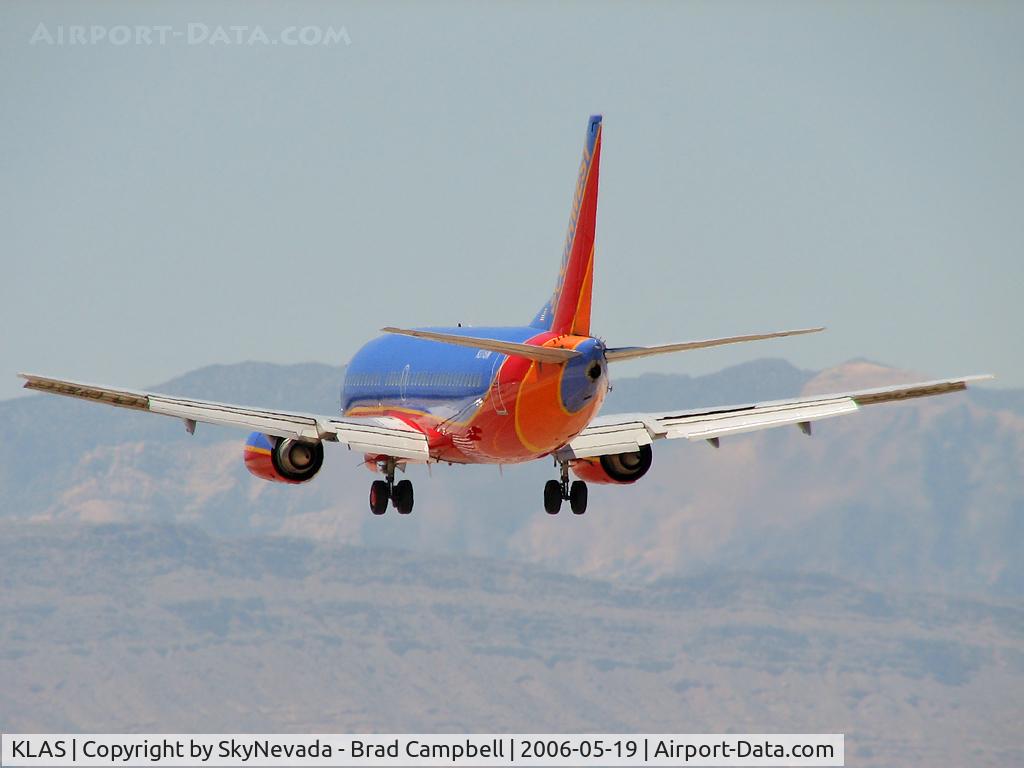 Harry Reid International Airport (LAS) - Southwest Airlines / Approach to RWY 25L with Spring Mountains in background.