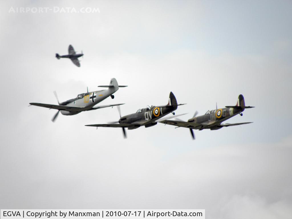 RAF Fairford Airport, Fairford, England United Kingdom (EGVA) - Two Spits and Me 109 in formation at RIAT 2010