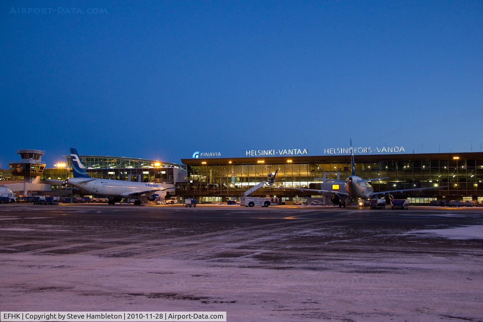 Helsinki-Vantaa Airport, Vantaa Finland (EFHK) - A view back towards the terminal building as we boarded our Embraer back to Manchester, UK. Temperature was -15