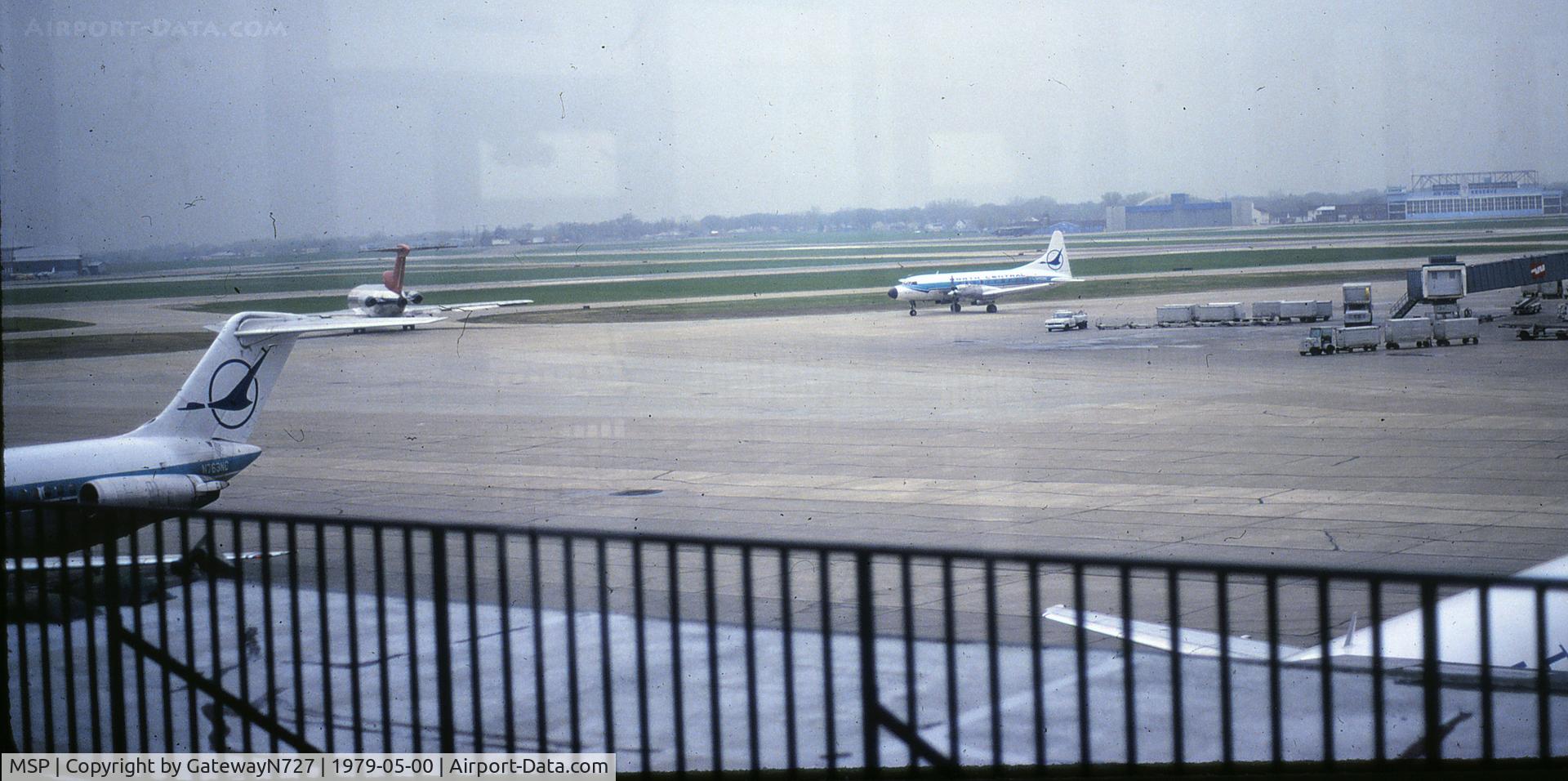 Minneapolis-st Paul Intl/wold-chamberlain Airport (MSP) - Taken from an observation deck long ago closed to the public on top of one of the concourses. N763NC on the left of the picture.