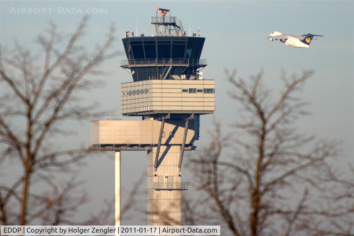 Leipzig/Halle Airport, Leipzig/Halle Germany (EDDP) - Eastwards view of Leipzig Tower, getting passed by LH 2165 to Munich.