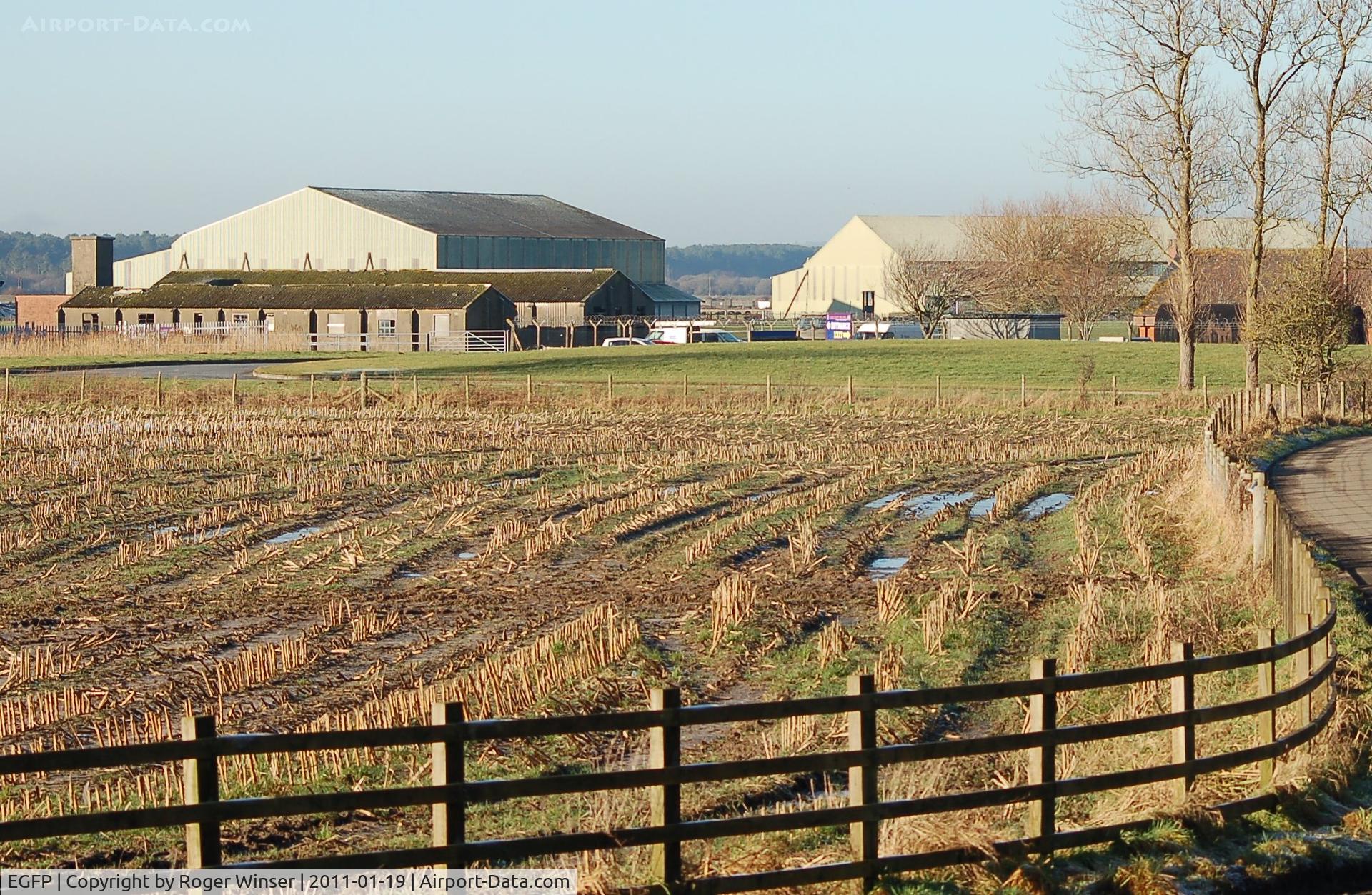 Pembrey Airport, Pembrey, Wales United Kingdom (EGFP) - Original late 1930's buildings and two F Type sheds on the former RAF Station Pembrey technical site.