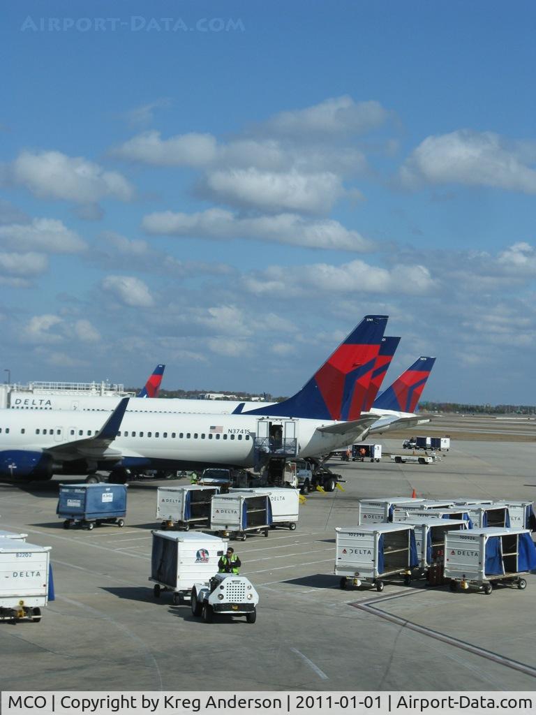 Orlando International Airport (MCO) - A row of Delta tails at MCO.