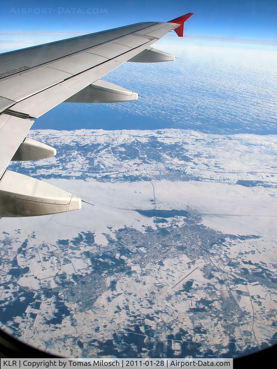 Kalmar Airport, Kalmar Sweden (KLR) - Onboard Air Berlin flight TXL–ARN (D-ABGI) we pass Kalmar airport. In the centre of the photo you can also see the bridge over to the isle of Öland. 