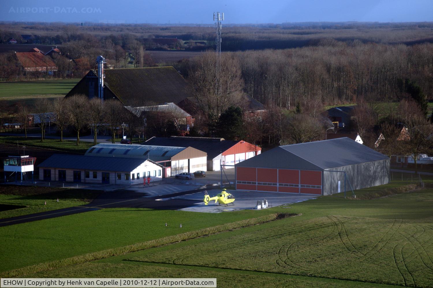 Oostwold Airport, Scheemda Netherlands (EHOW) - The airports buildings and platform with medevac helicopter PH-MMT and its friendly pilots.