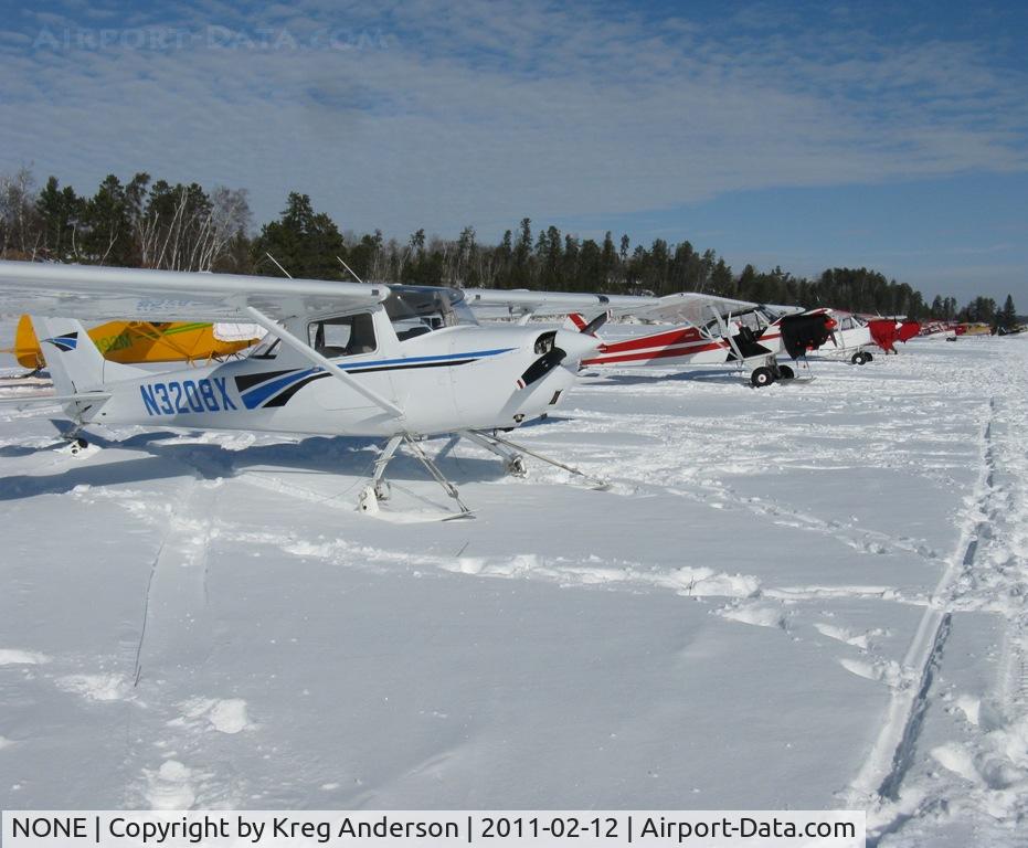 NONE Airport - A whole line of ski planes at the 1st Annual Zorbaz Ski-plane Chili Fly-in at Zhateau Zorbaz in Park Rapids, MN.