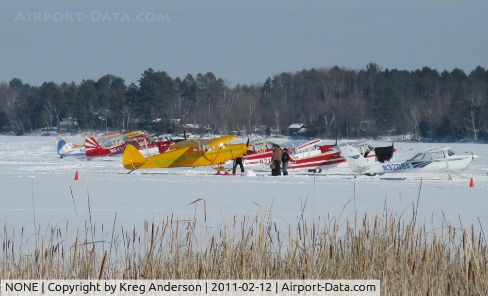 NONE Airport - A view of all the planes in attendance at the 1st Annual Zorbaz Ski-plane Chili Fly-in at Zhateau Zorbaz in Park Rapids, MN.
