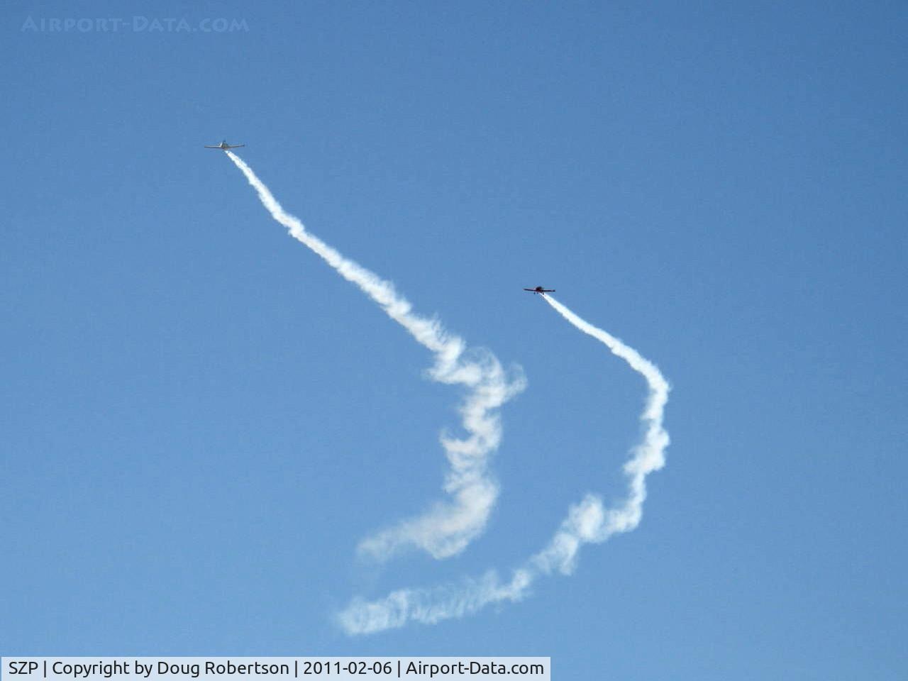 Santa Paula Airport (SZP) - N779LH and N999ST spectacular smoke formation arrival over SZP's First Sunday Aviation Museum Fly-In prior to tandem landing Rwy 04