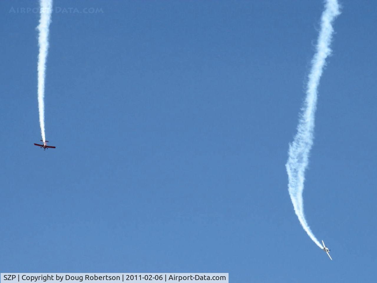 Santa Paula Airport (SZP) - N999ST and N779LH spectacular smoke formation arrival over SZP's First Sunday Aviation Museum Fly-In prior to tandem landing Rwy 04 