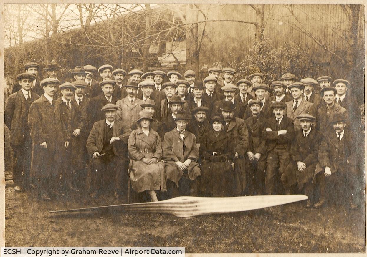 Norwich International Airport, Taken during WW1, this is a picture of staff at the Boulton Paul propellar factory and taken out side with one of their products. One of the workers is my Grandfather. 