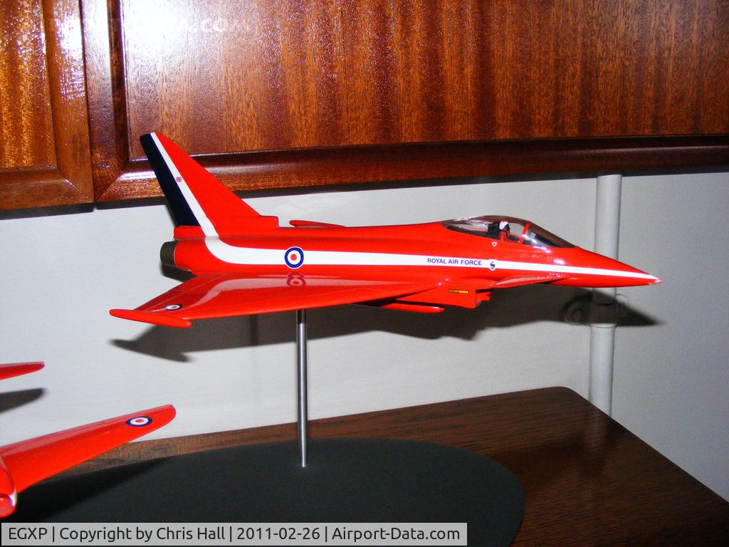 RAF Scampton Airport, Scampton, England United Kingdom (EGXP) - model of a Eurofighter Typhoon in Red Arrows colours