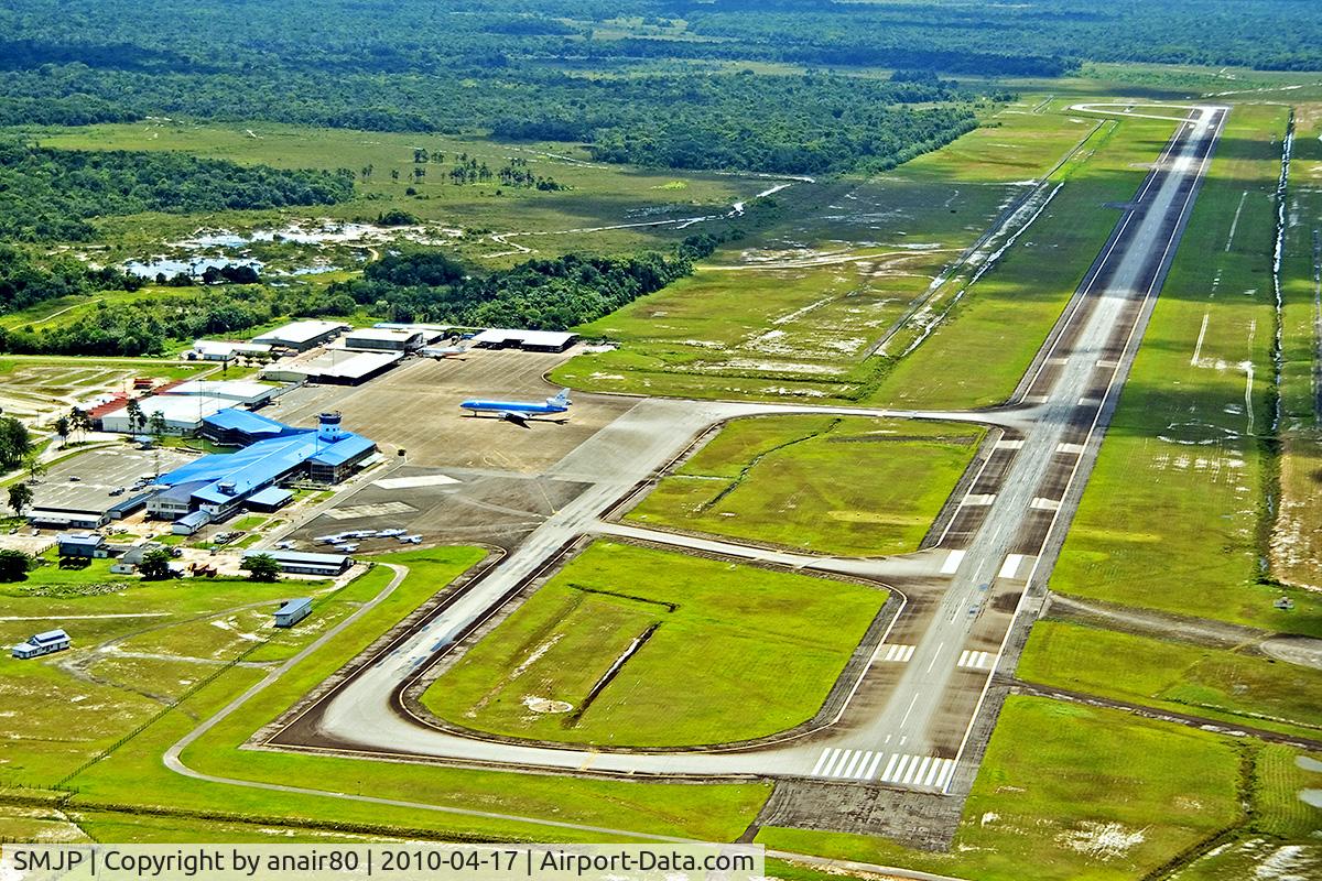 Johan Adolf Pengel International Airport (Zanderij Int'l), Zanderij Suriname (SMJP) - Overview of SMJP RWY 11/29 with on the ramp a KLM MD-11, two Surinam Airways B733 in/ outside the hangar, and a few domestic airline birds on the ramp.