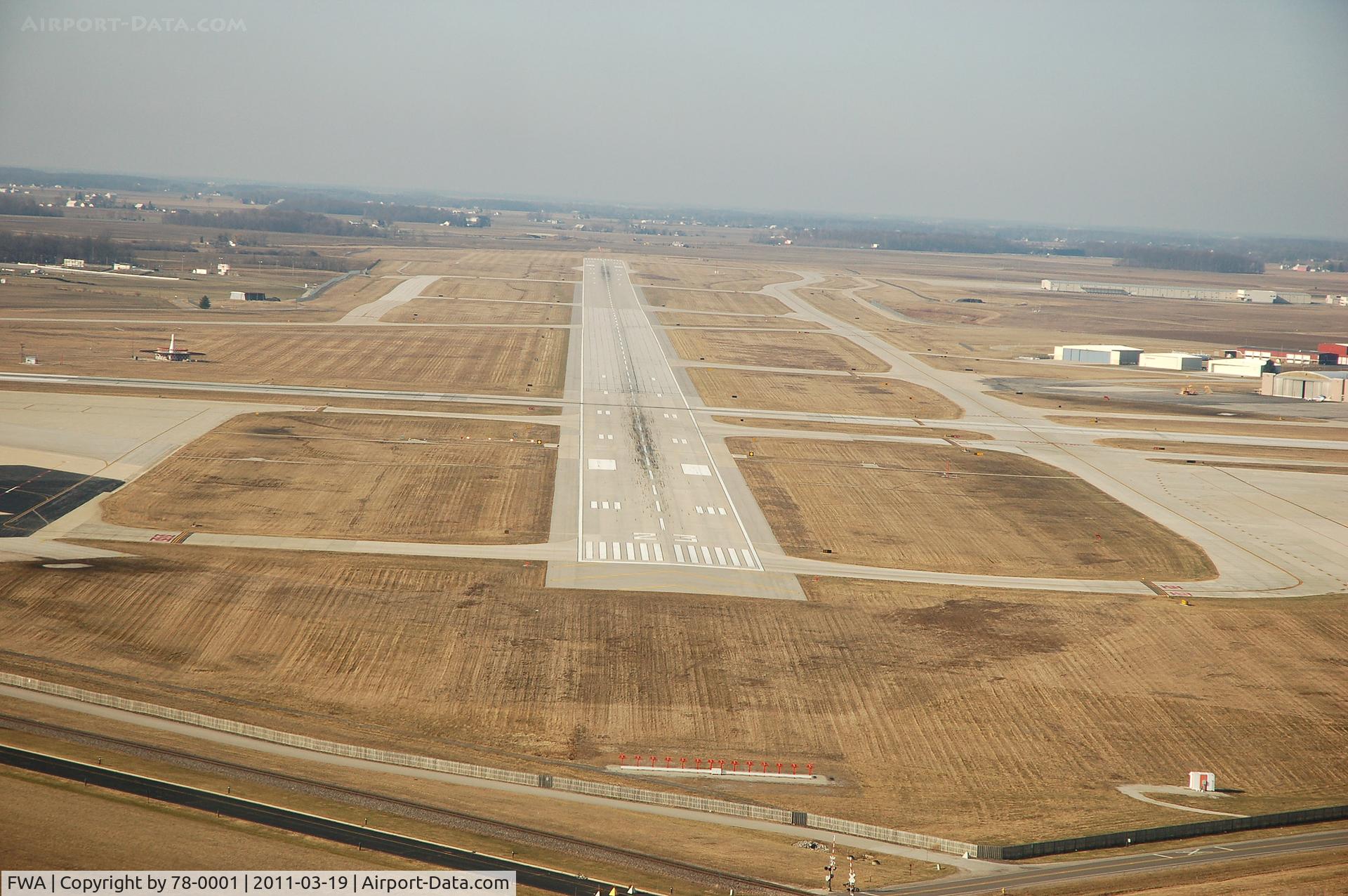 Fort Wayne International Airport (FWA) - My daughter took this photo while we were turning final for 23. My longest VFR cross country to date. We were a little high, there is also alot of runway. No reason to set it down on the first 10 feet!