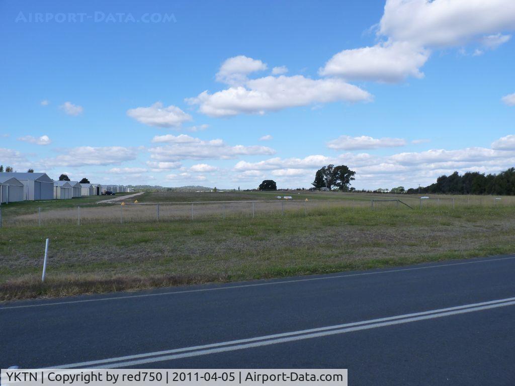 Kyneton Airport, Kyneton, Victoria Australia (YKTN) - Kyneton Airfield Hangars and grass strip looking east.