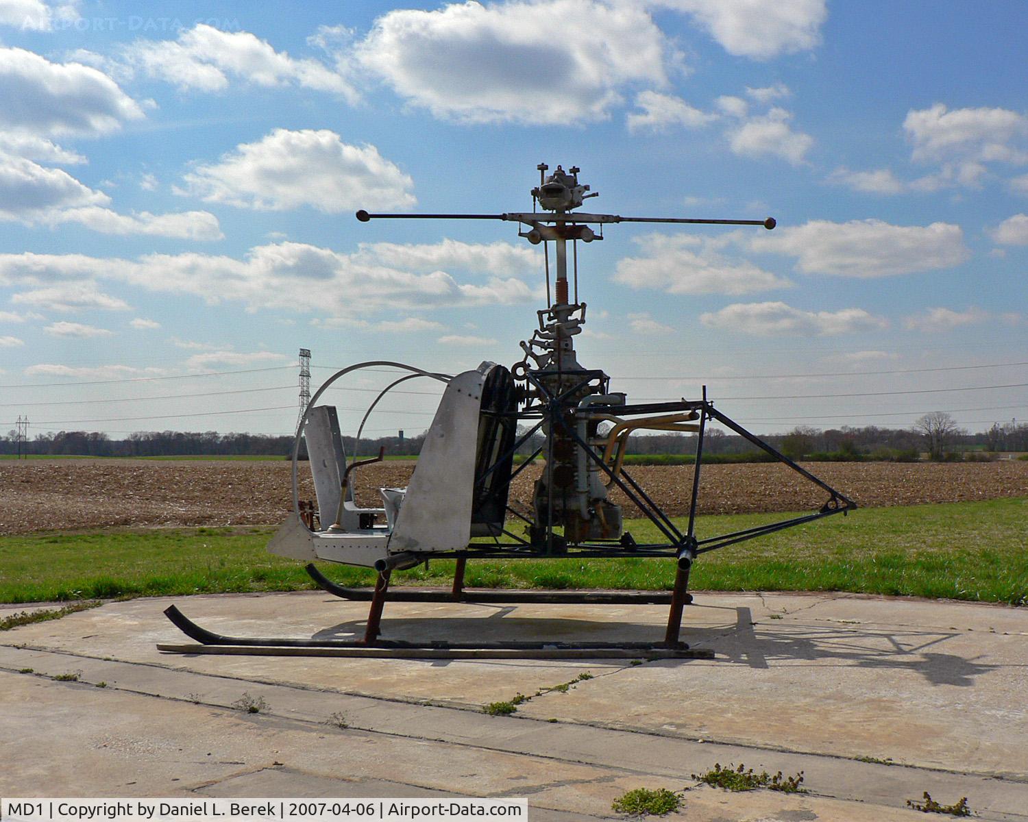 Massey Aerodrome Airport (MD1) - The Massey Air Museum provides this shell of a Bell J-47G for the youngest enthusiasts to play on.