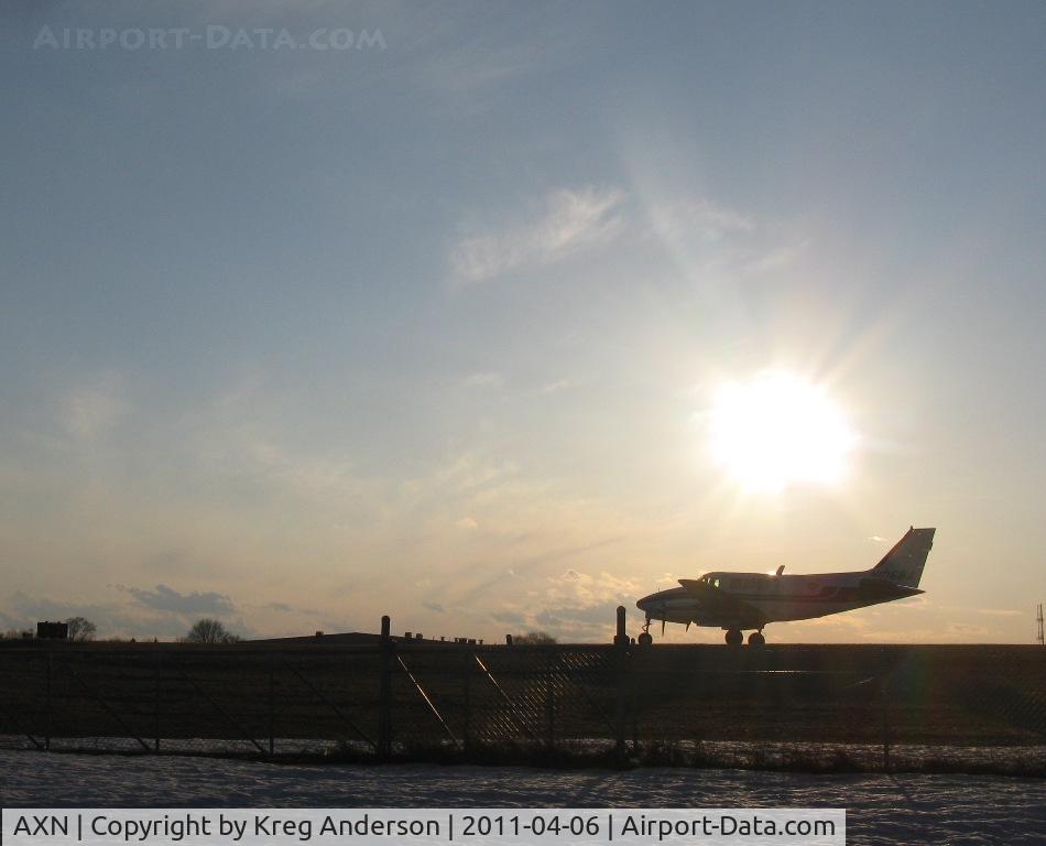 Chandler Field Airport (AXN) - Bemidji Aviation's Beech Queen Air N106BA running up its engines for the evening parcel run to MSP.