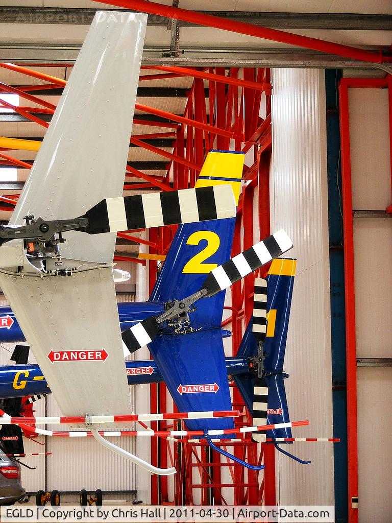 Denham Aerodrome Airport, Gerrards Cross, England United Kingdom (EGLD) - Robinson R44's in the Heliair hangar at Denham Aerodrome