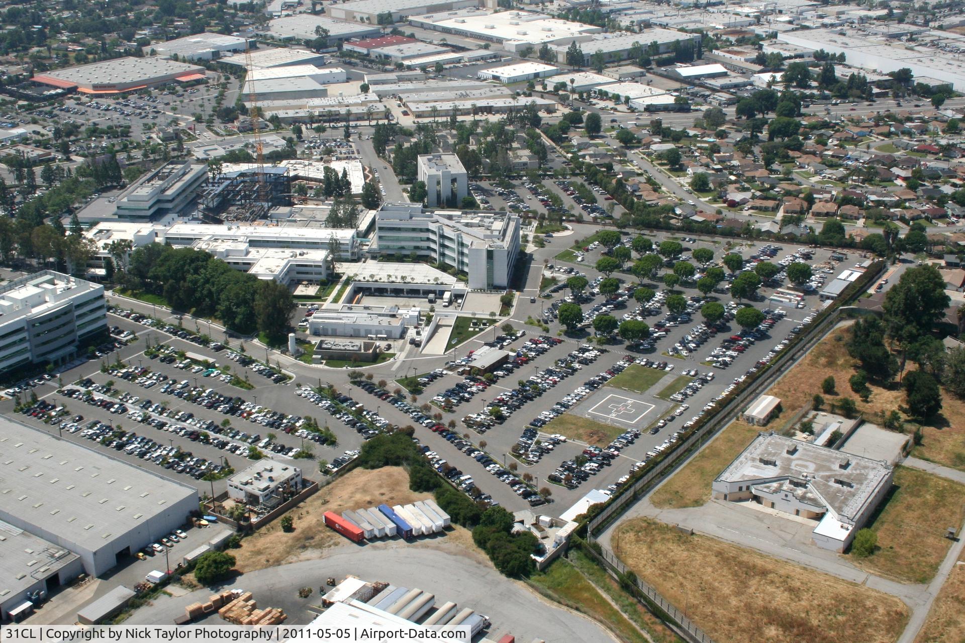 Presbyterian Intercommunity Hospital Heliport (31CL) - Overview of the whole hospital. Helipad is in the parking lot.