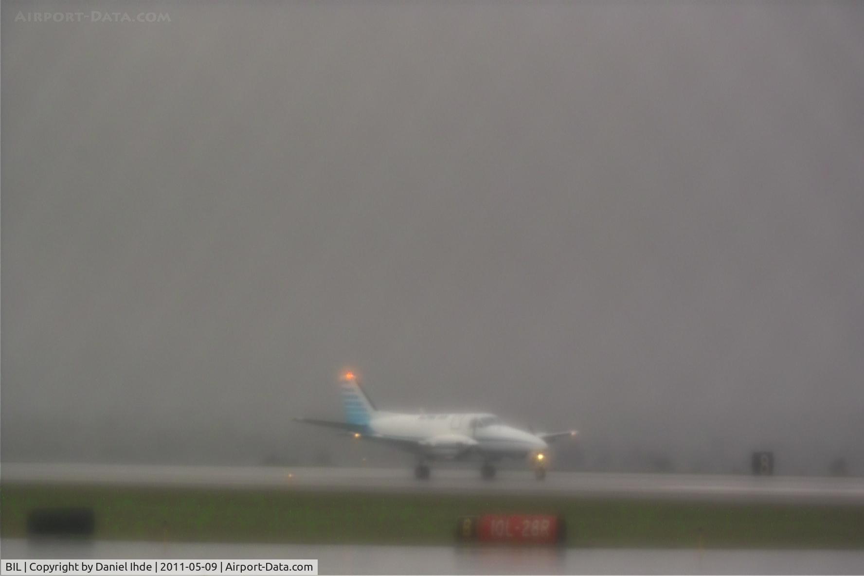 Billings Logan International Airport (BIL) - Alpine Air at Billings Logan in a rain storm.