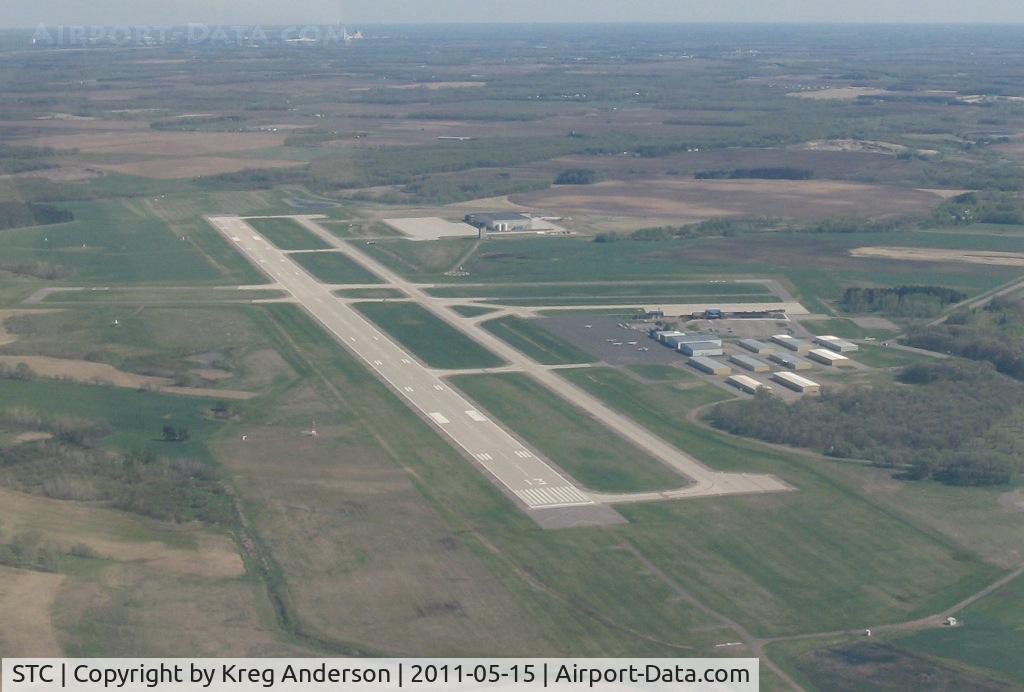 St Cloud Regional Airport (STC) - Overflying St. Cloud Regional Airport after departing runway 5. Looking southeast.