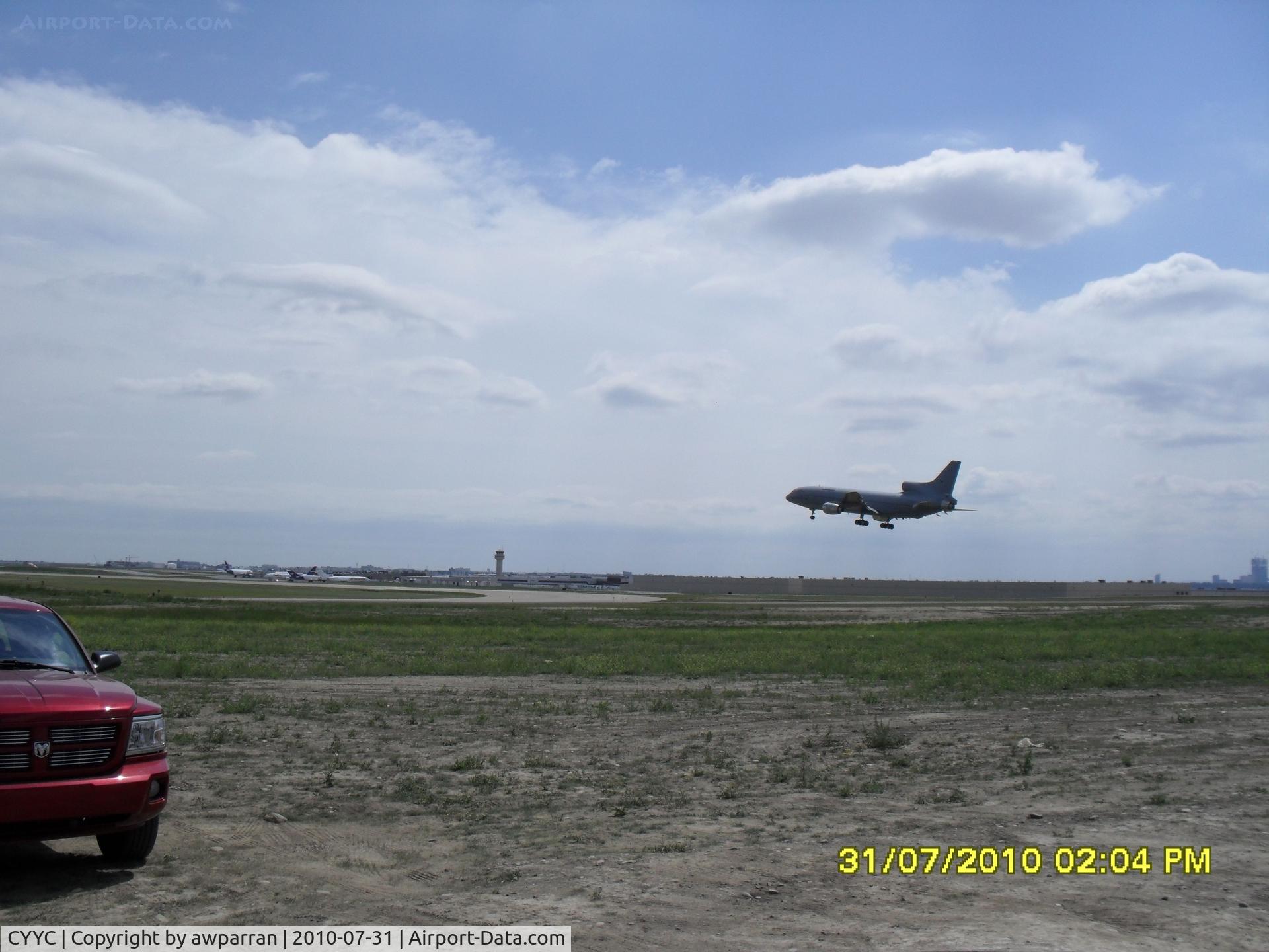 Calgary International Airport, Calgary, Alberta Canada (CYYC) - This is a rare sighting of an L-1011 landing on runway 10 at Calgary.